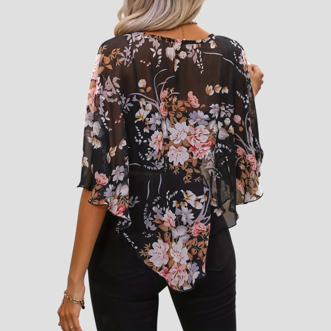 Chiara – Blusa Floreale Asimmetrica con Girocollo Elegante