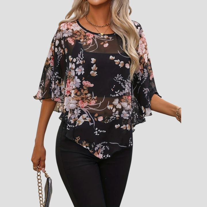 Chiara – Blusa Floreale Asimmetrica con Girocollo Elegante